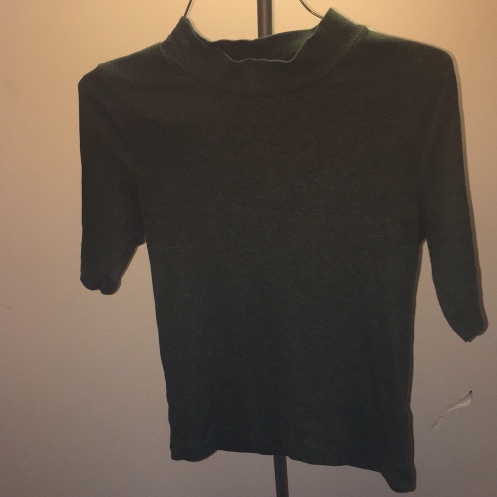 Green turtle neck top